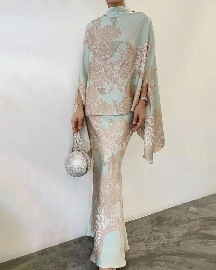 CONJUNTO ELEGANTE DE CAPA Y FALDA