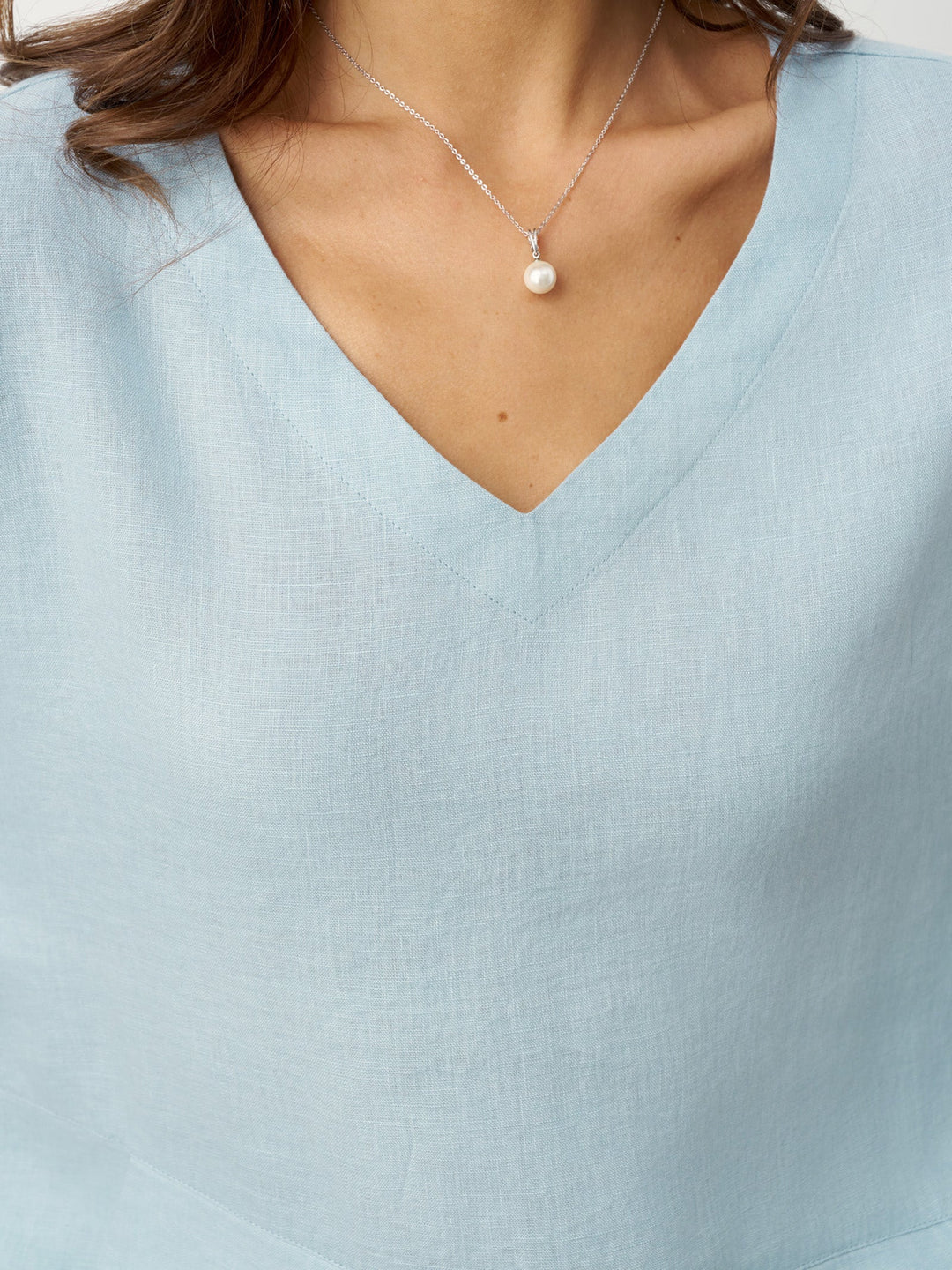 CAMISA DE LINO BAJO ASIMÉTRICO